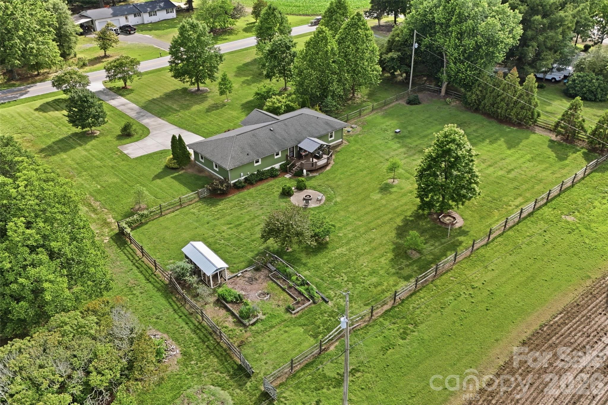4712 Secrest Short Cut Road Monroe, NC 28110 - Photo 28 of 30 an aerial view of a house with a yard
