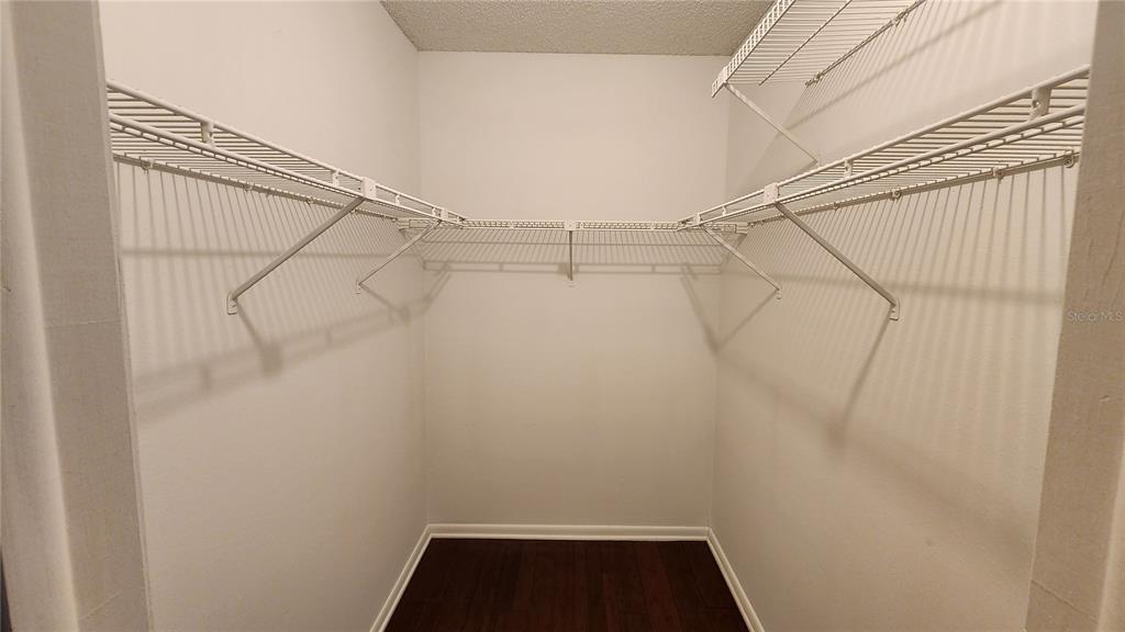 14921 Old Pointe Road Tampa, FL 33613 - Photo 15 of 32 a view of a room with racks on the wall