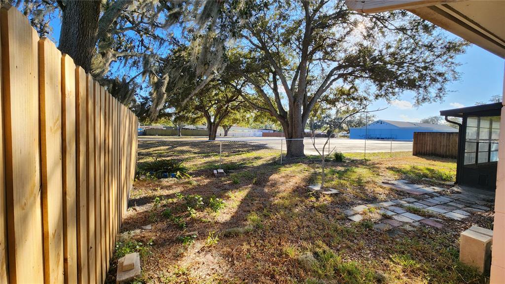 14921 Old Pointe Road Tampa, FL 33613 - Photo 25 of 32 a view of back yard of the house