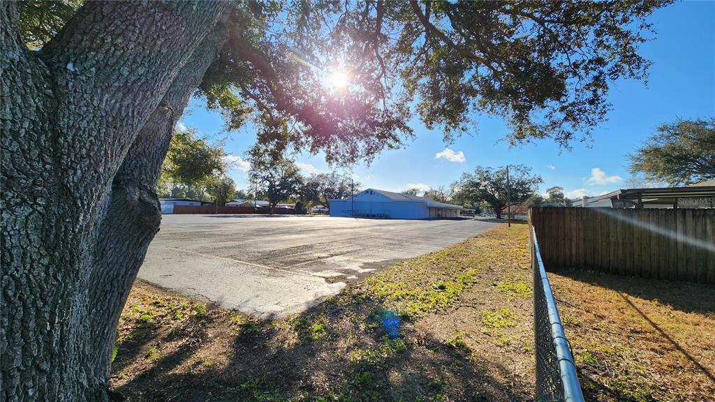 14921 Old Pointe Road Tampa, FL 33613 - Photo 27 of 32 a view of backyard with wooden fence