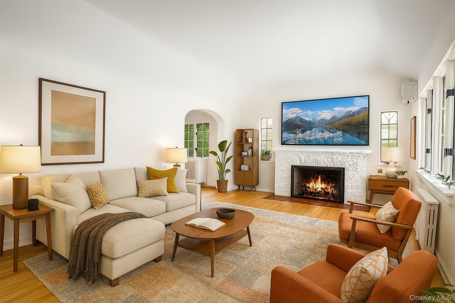 115 Coolidge Avenue Rye, NY 10580 - Photo 4 of 27 a living room with furniture a flat screen tv and a fireplace