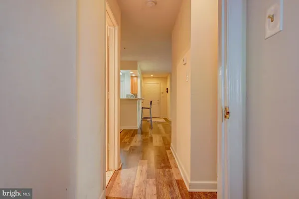 a view of a bathroom with a sink and a mirror