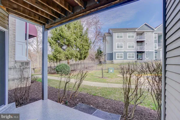 a house view with a backyard space