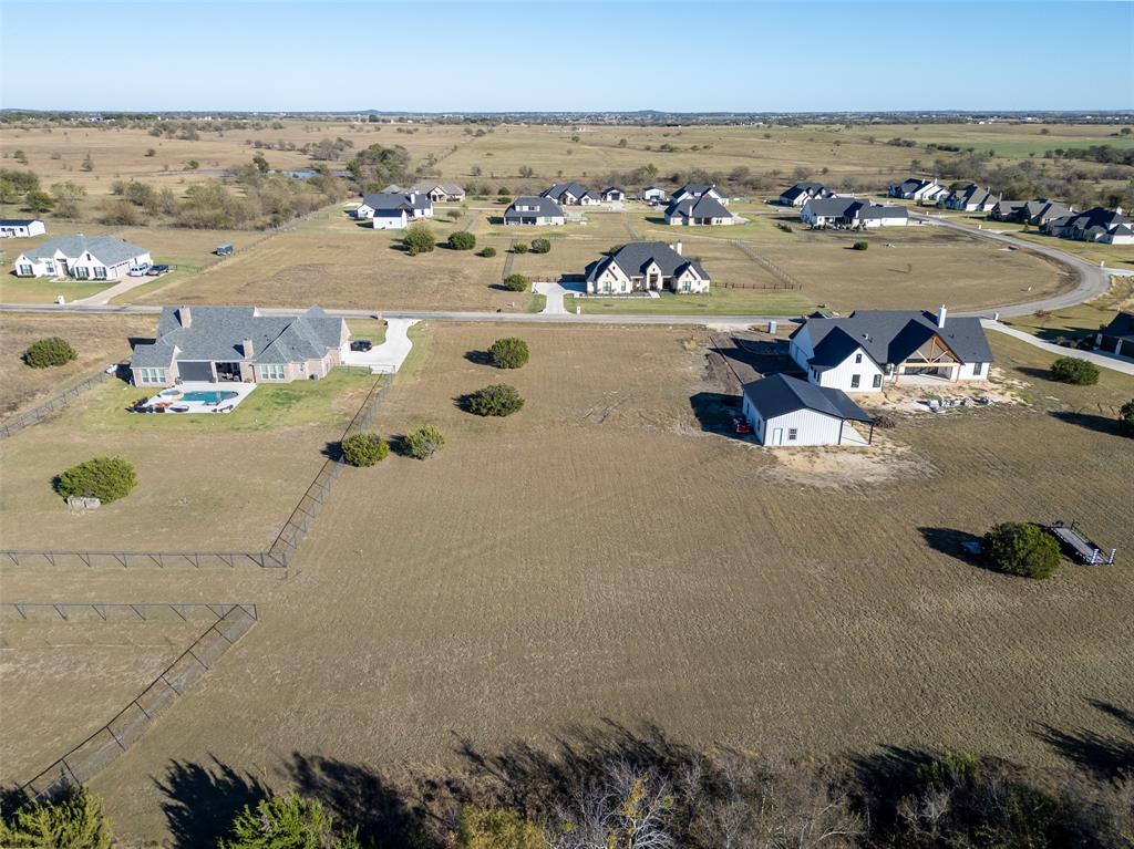 6335 Rigel Road Godley, TX 76044 - Photo 4 of 6 an aerial view of a building and ocean view