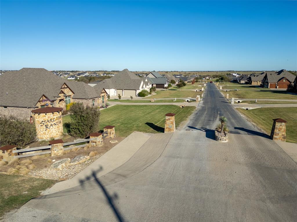 6335 Rigel Road Godley, TX 76044 - Photo 5 of 6 an aerial view of a house with a ocean view