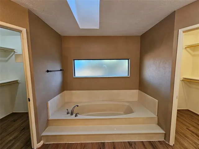 a bathroom with a bathtub
