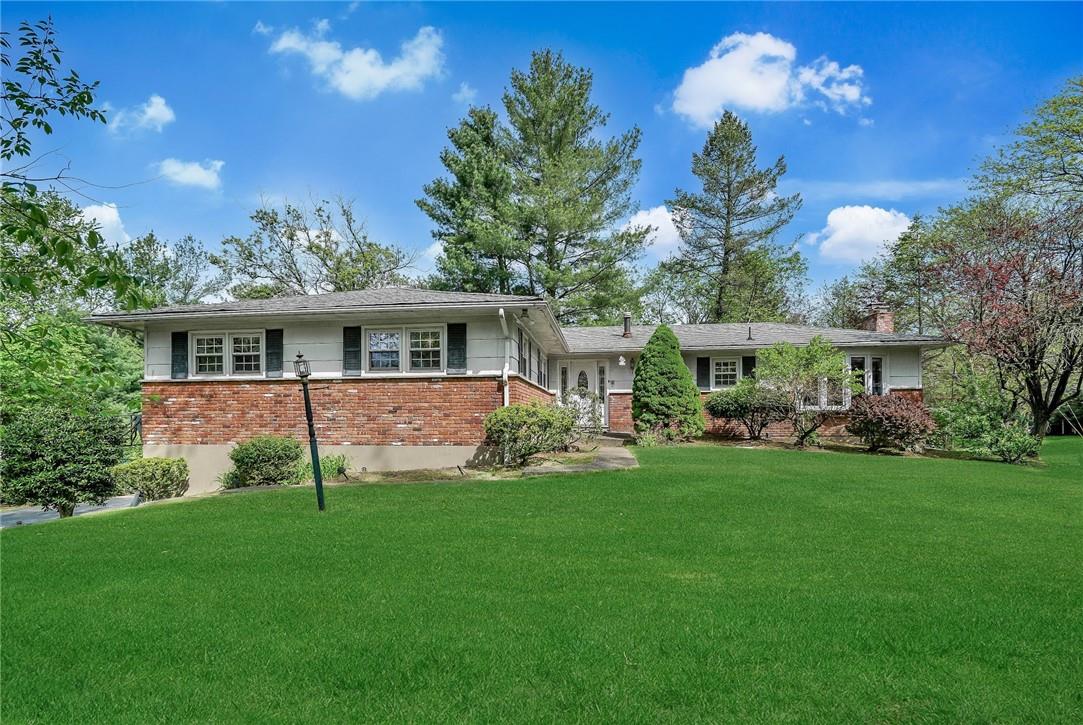 1 Briar Court Chestnut Ridge, NY 10977 - Photo 1 of 1 a view of a house with a yard porch and sitting area
