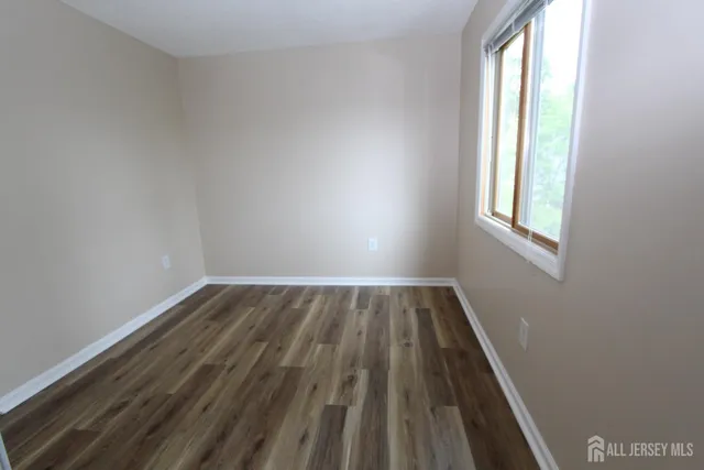 a bathroom with a toilet a sink and a bathtub