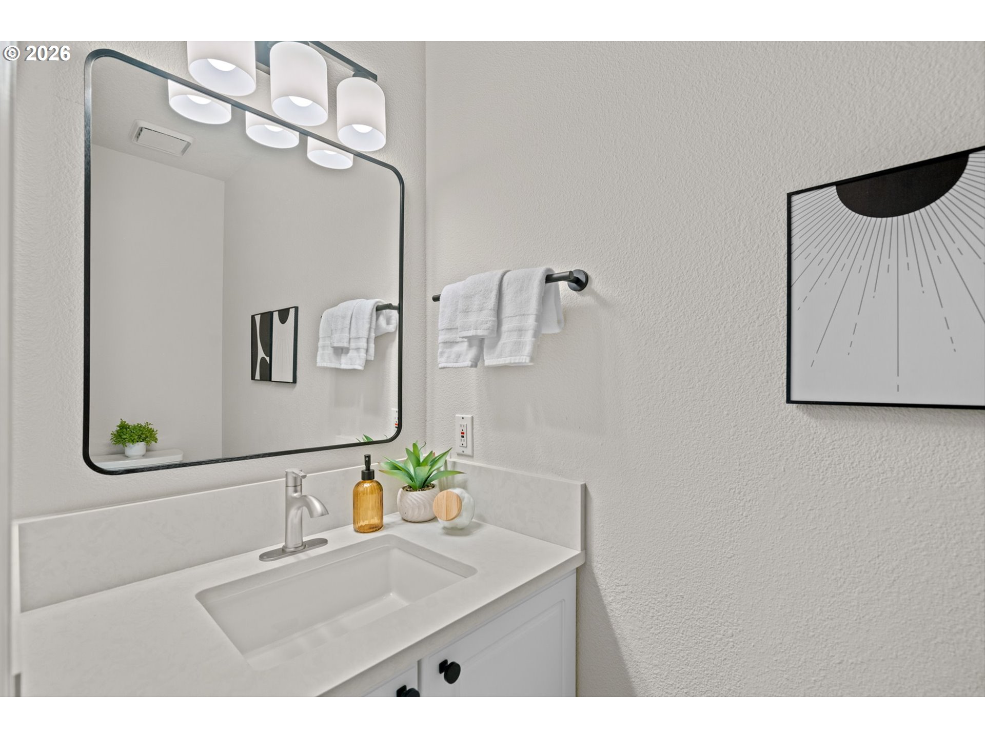 462 Southwest 211th Avenue Beaverton, OR 97006 - Photo 17 of 40 a bathroom with a sink a mirror and a shower