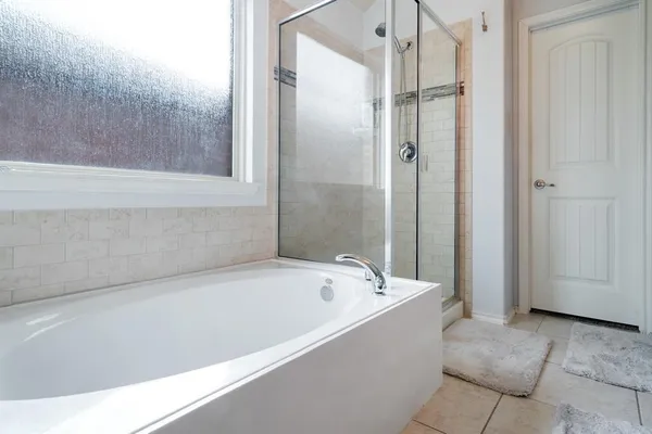 a kitchen with granite countertop kitchen island a counter space a sink and appliances