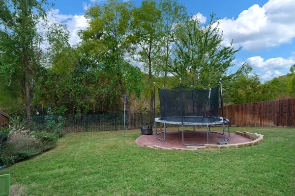 a view of a backyard with a barn