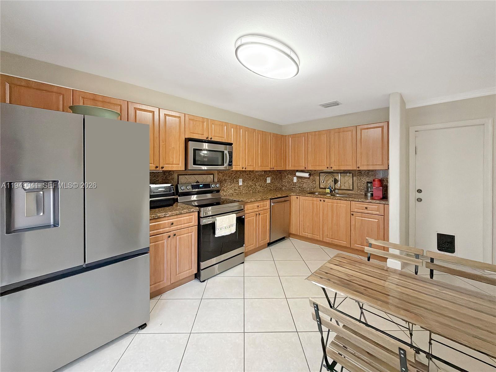 7355 Northwest 173rd Drive, Unit 103 Hialeah, FL 33015 - Photo 14 of 37