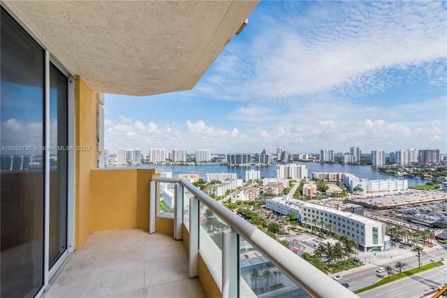 a city view from a balcony
