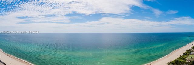 a view of a field with an empty space