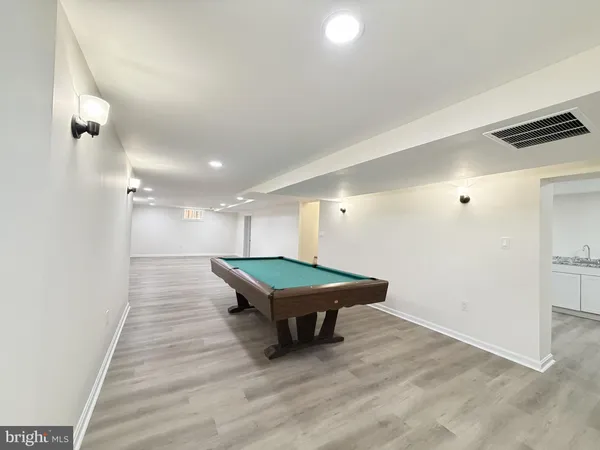 a empty room with a window and furniture