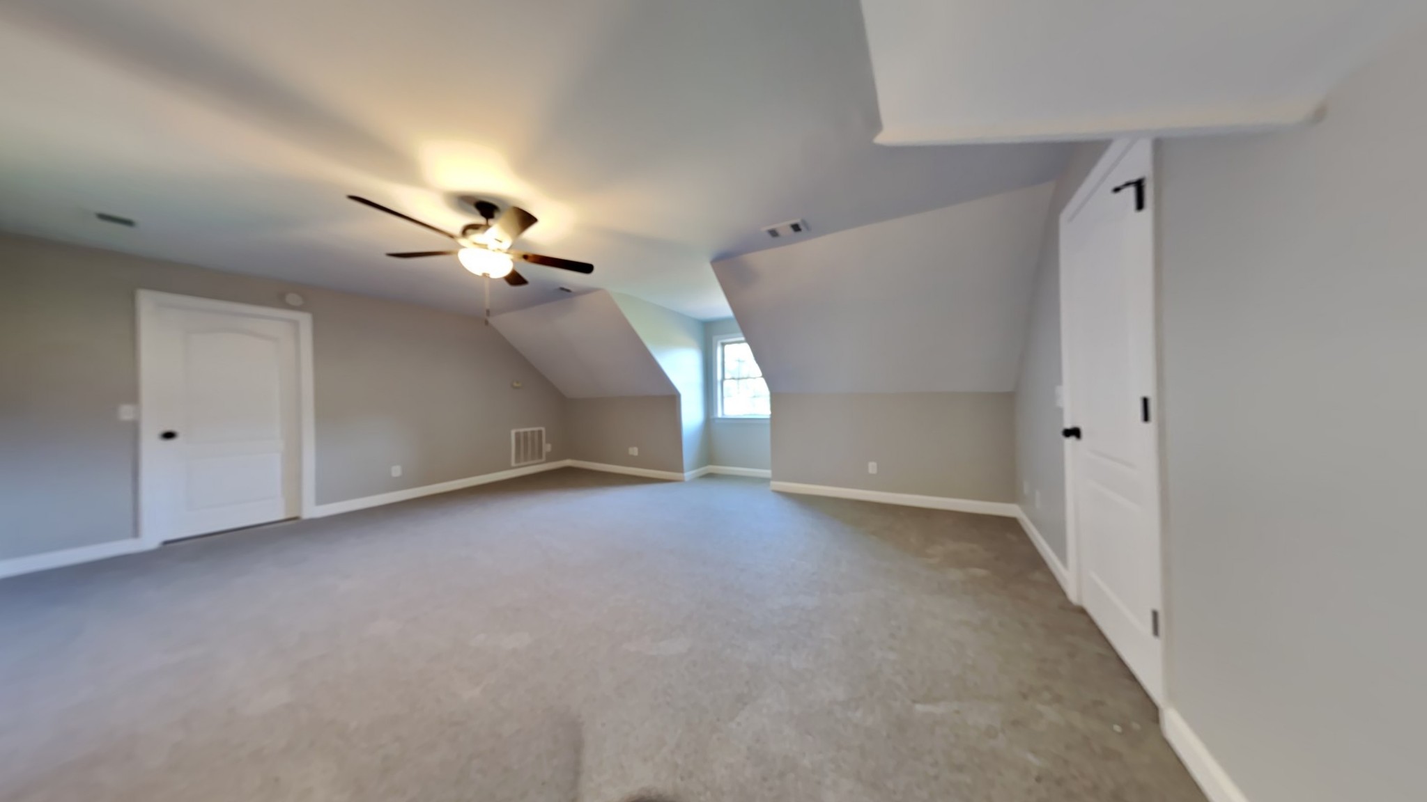 1024 Nina Drive Springfield, TN 37172 - Photo 13 of 16 a view of an empty room with a ceiling fan