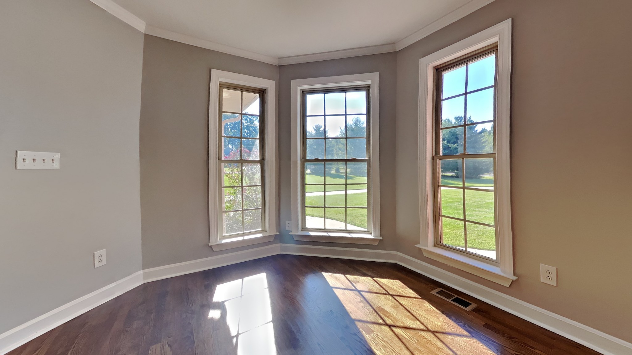 1024 Nina Drive Springfield, TN 37172 - Photo 6 of 16 a view of an empty room with wooden floor and a window