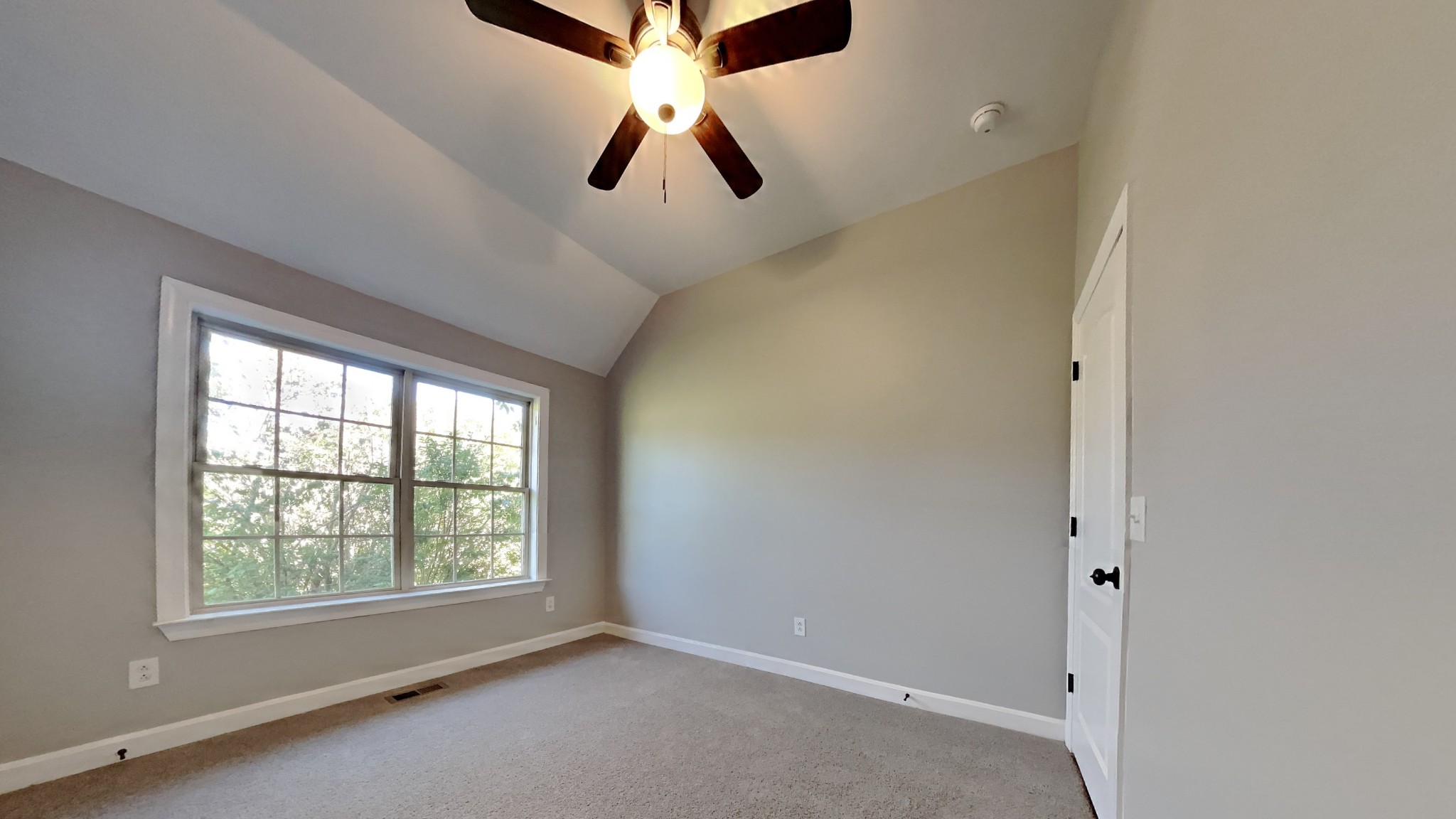 1024 Nina Drive Springfield, TN 37172 - Photo 10 of 16 an empty room with windows and ceiling fan