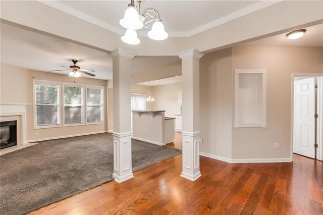 a large kitchen with stainless steel appliances granite countertop a stove oven and a sink