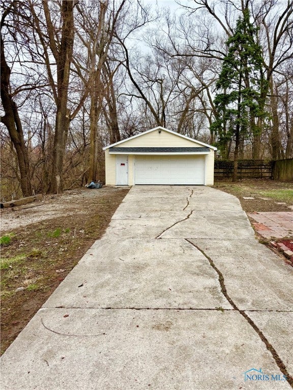 2097 Maginnis Road Oregon, OH 43616 - Photo 34 of 39 Long concrete driveway