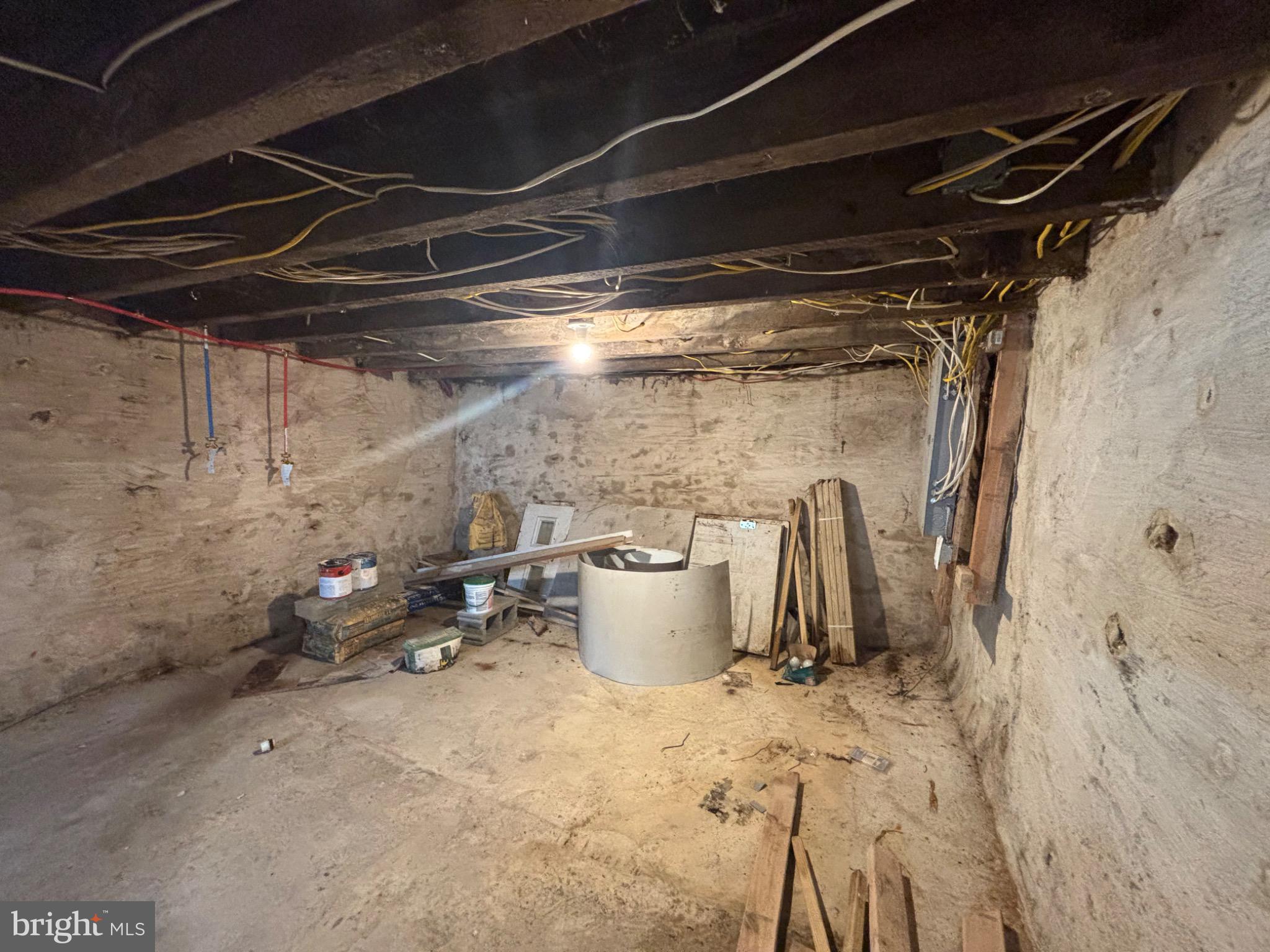 73 East Cosgrove Street Philadelphia, PA 19144 - Photo 11 of 21 a view of a storage room with water heater and racks