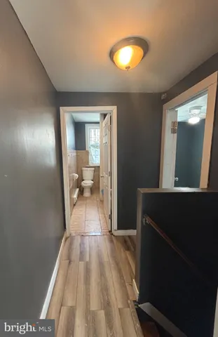 a view of a bedroom from a corridor