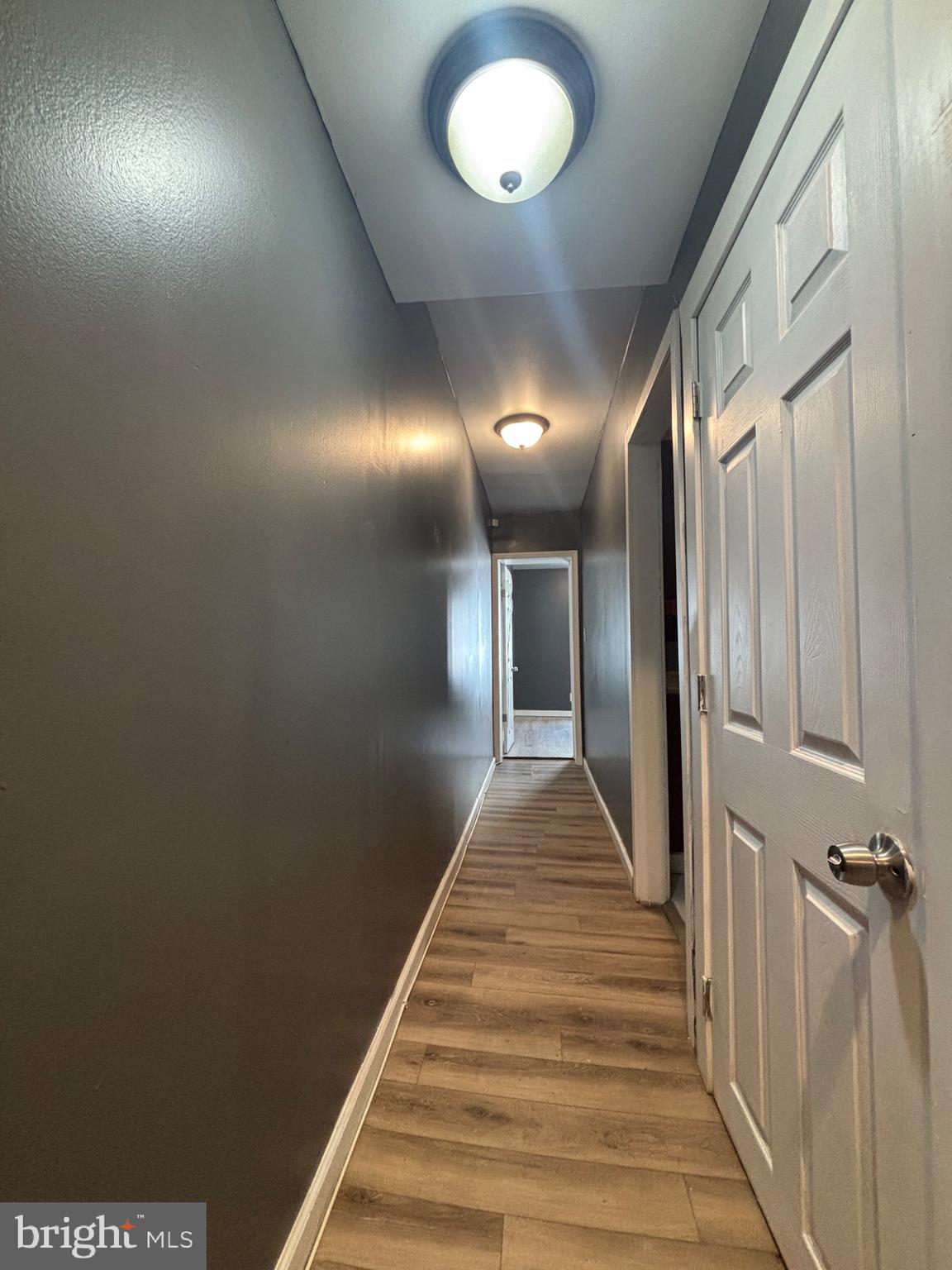 73 East Cosgrove Street Philadelphia, PA 19144 - Photo 3 of 21 a view of a hallway with wooden floor and staircase