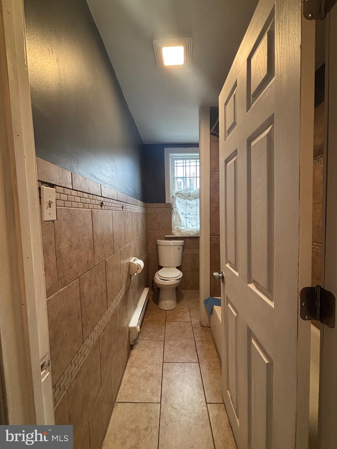 73 East Cosgrove Street Philadelphia, PA 19144 - Photo 6 of 21 a bathroom with a toilet and a shower