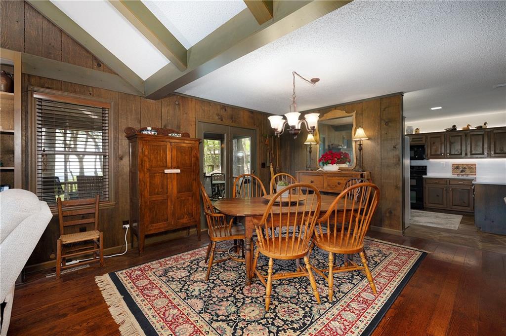 1339 Ridgeview Drive Big Canoe, GA 30143 - Photo 35 of 78 a view of a dining room with furniture