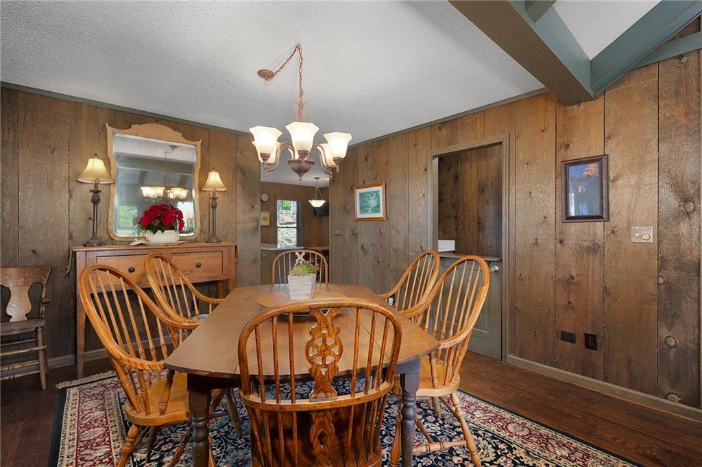 1339 Ridgeview Drive Big Canoe, GA 30143 - Photo 36 of 78 a view of a dining room with furniture and chandelier