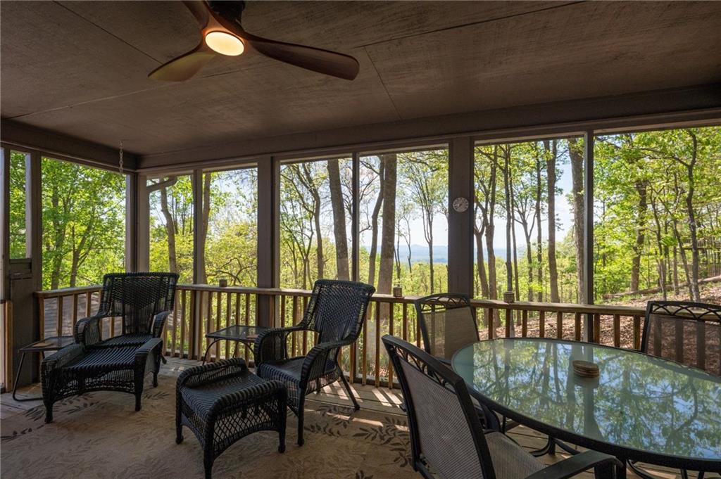 1339 Ridgeview Drive Big Canoe, GA 30143 - Photo 44 of 78 a view of a dining room with furniture window and outside view