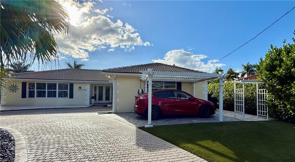 2120 Sandpiper Street Naples, FL 34102 - Photo 45 of 48 Tesla charger