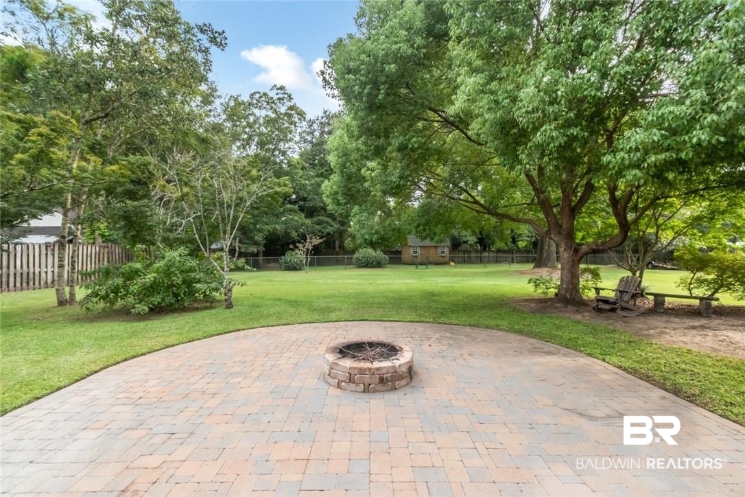 8837 Dawes Lake Road South Mobile, AL 36619 - Photo 36 of 44 View of patio featuring an outdoor fire pit
