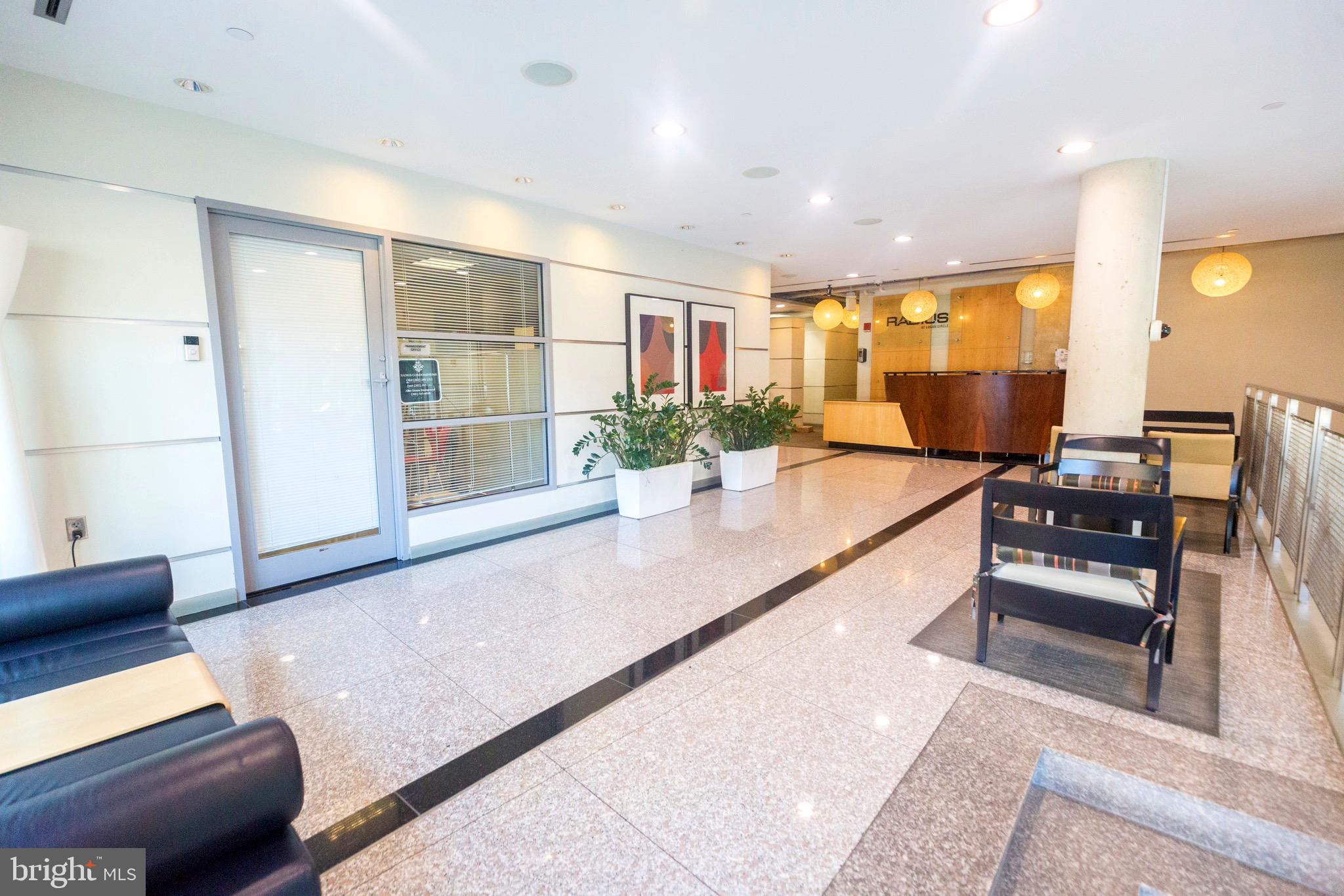 1300 N Street Northwest, Unit 403 Washington, DC 20005 - Photo 29 of 37 Inviting Lobby with Desk service 1-9pm