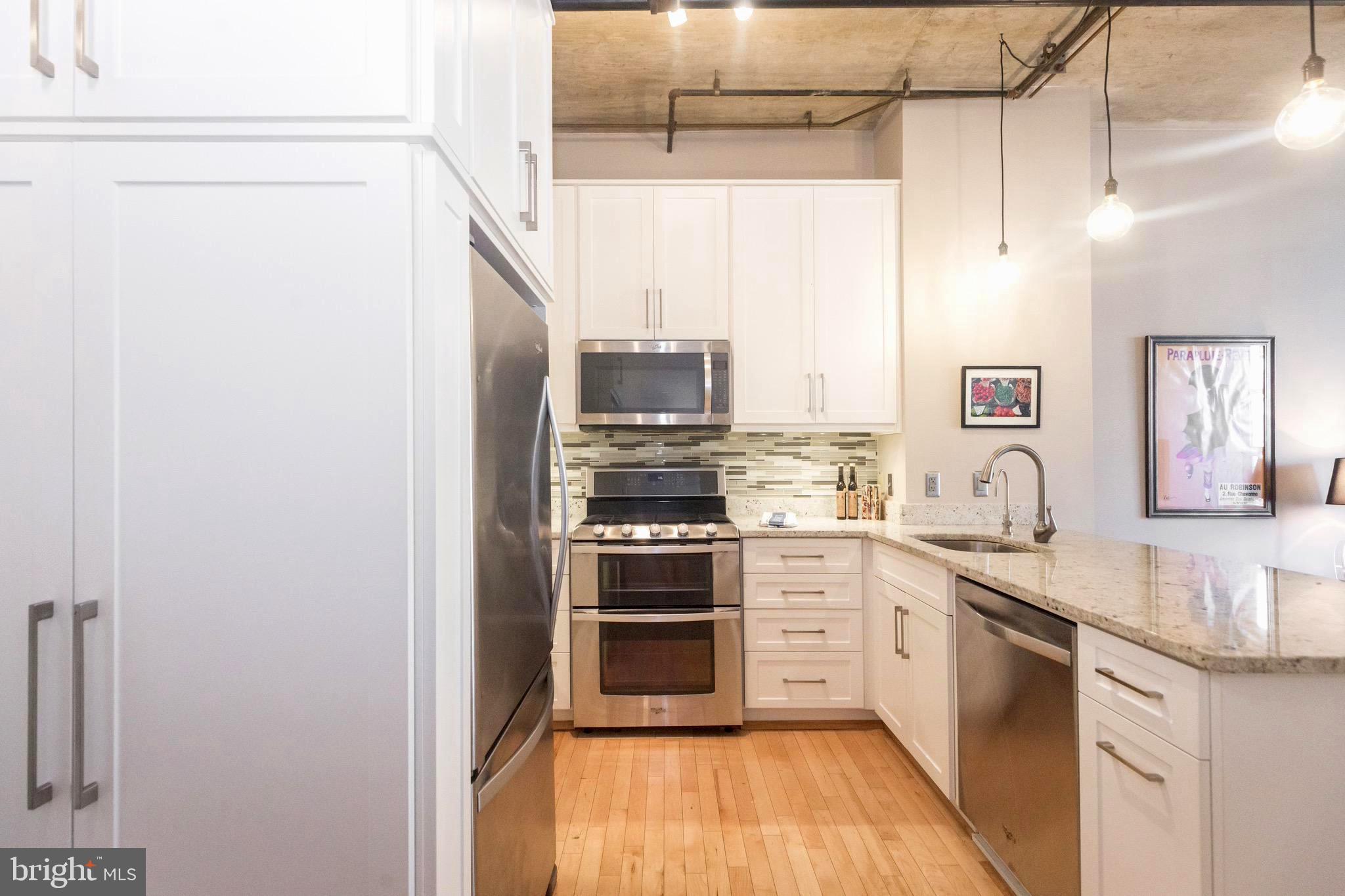 1300 N Street Northwest, Unit 403 Washington, DC 20005 - Photo 4 of 37 Custom Kitchen with Tons of Storage!