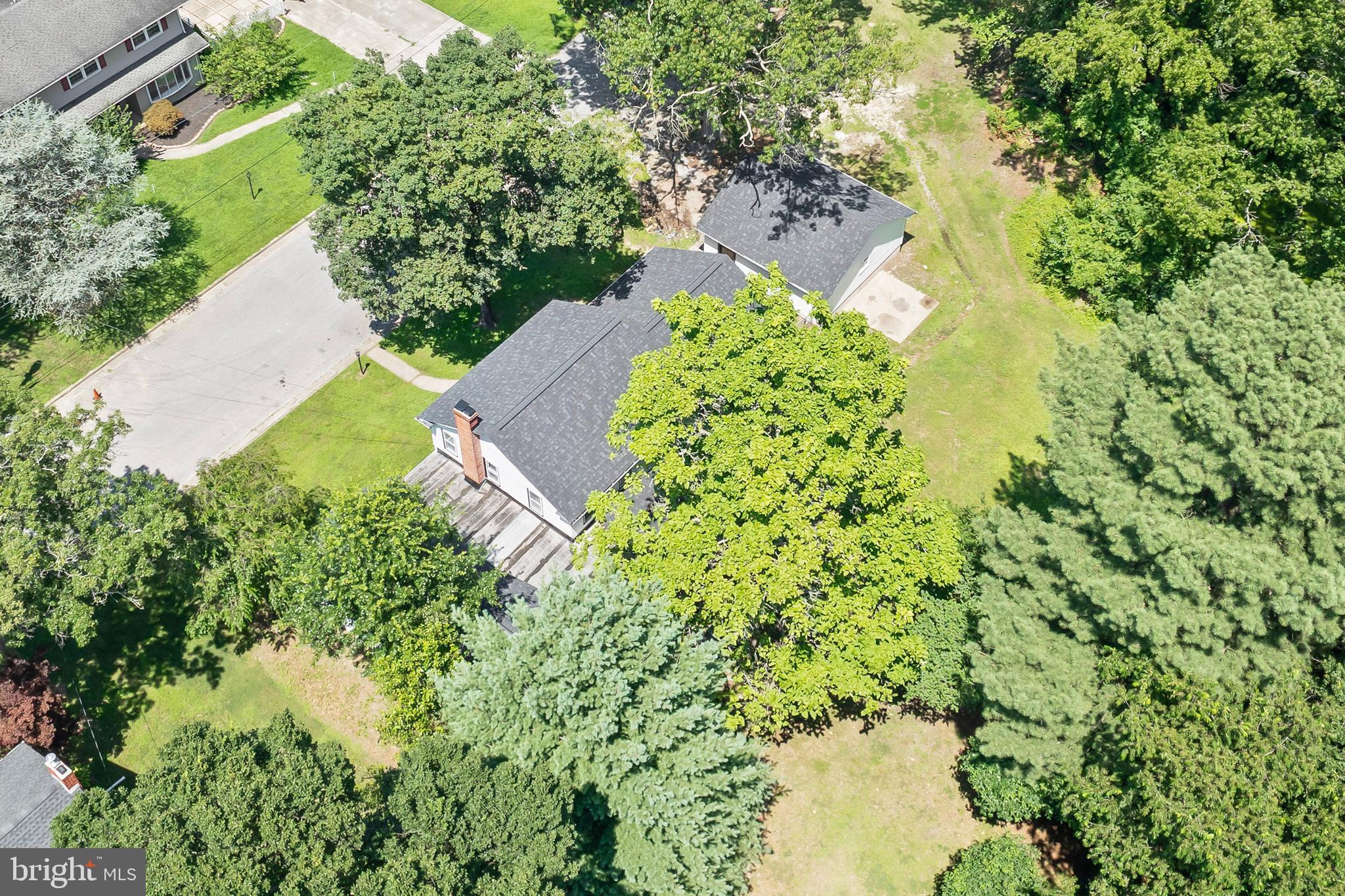 583 Orchard Road Carneys Point, NJ 08069 - Photo 17 of 62 an aerial view of residential house with outdoor space and trees all around