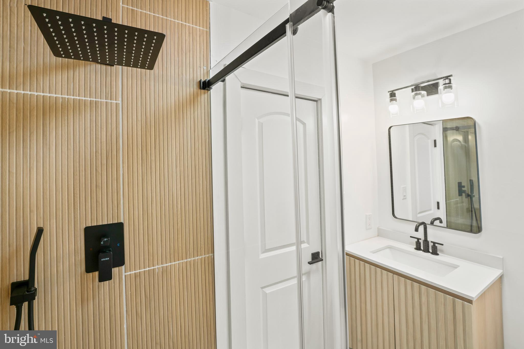 583 Orchard Road Carneys Point, NJ 08069 - Photo 30 of 62 a bathroom with a sink and mirror