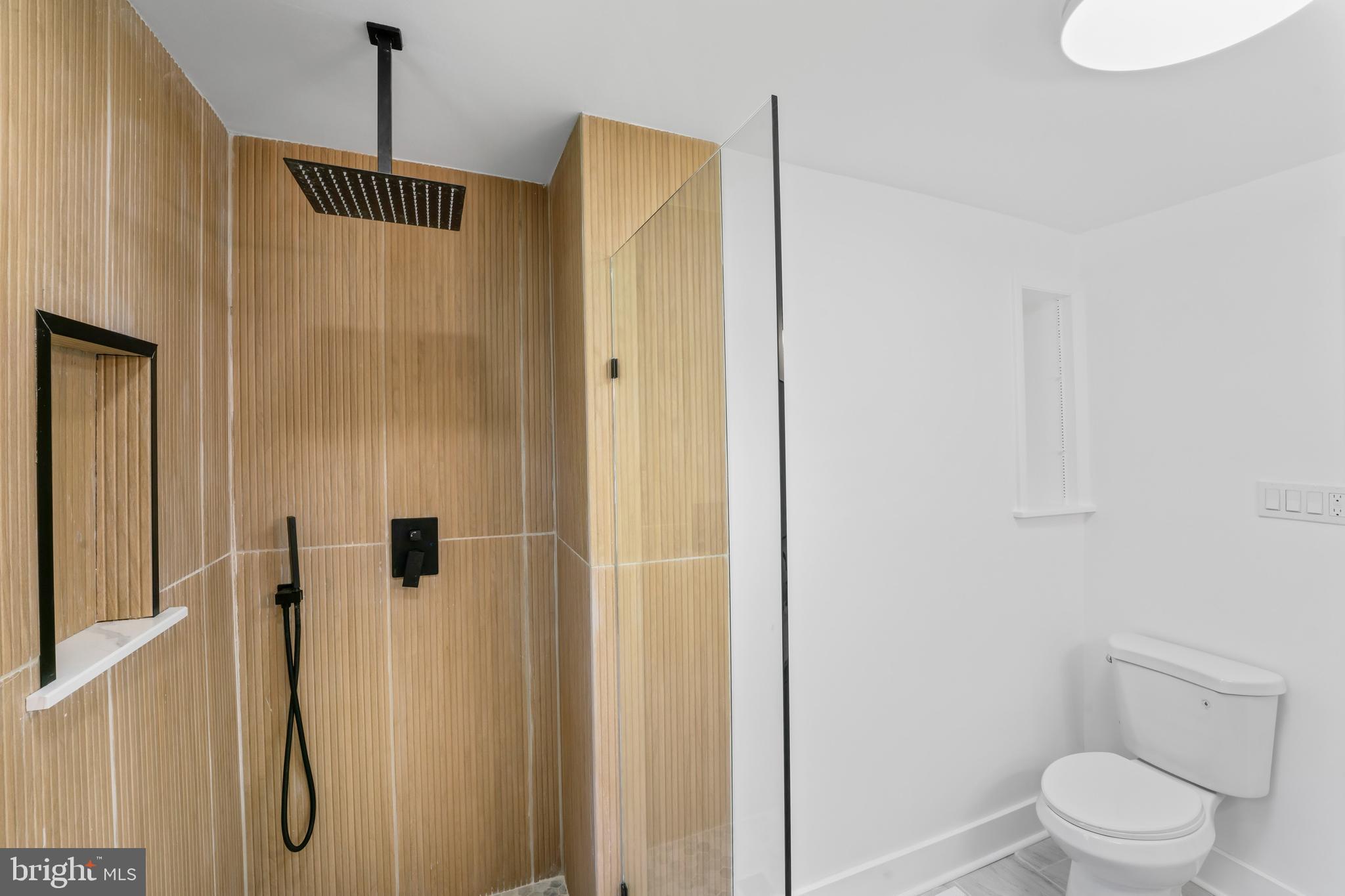 583 Orchard Road Carneys Point, NJ 08069 - Photo 43 of 62 a bathroom with a shower toilet and sink
