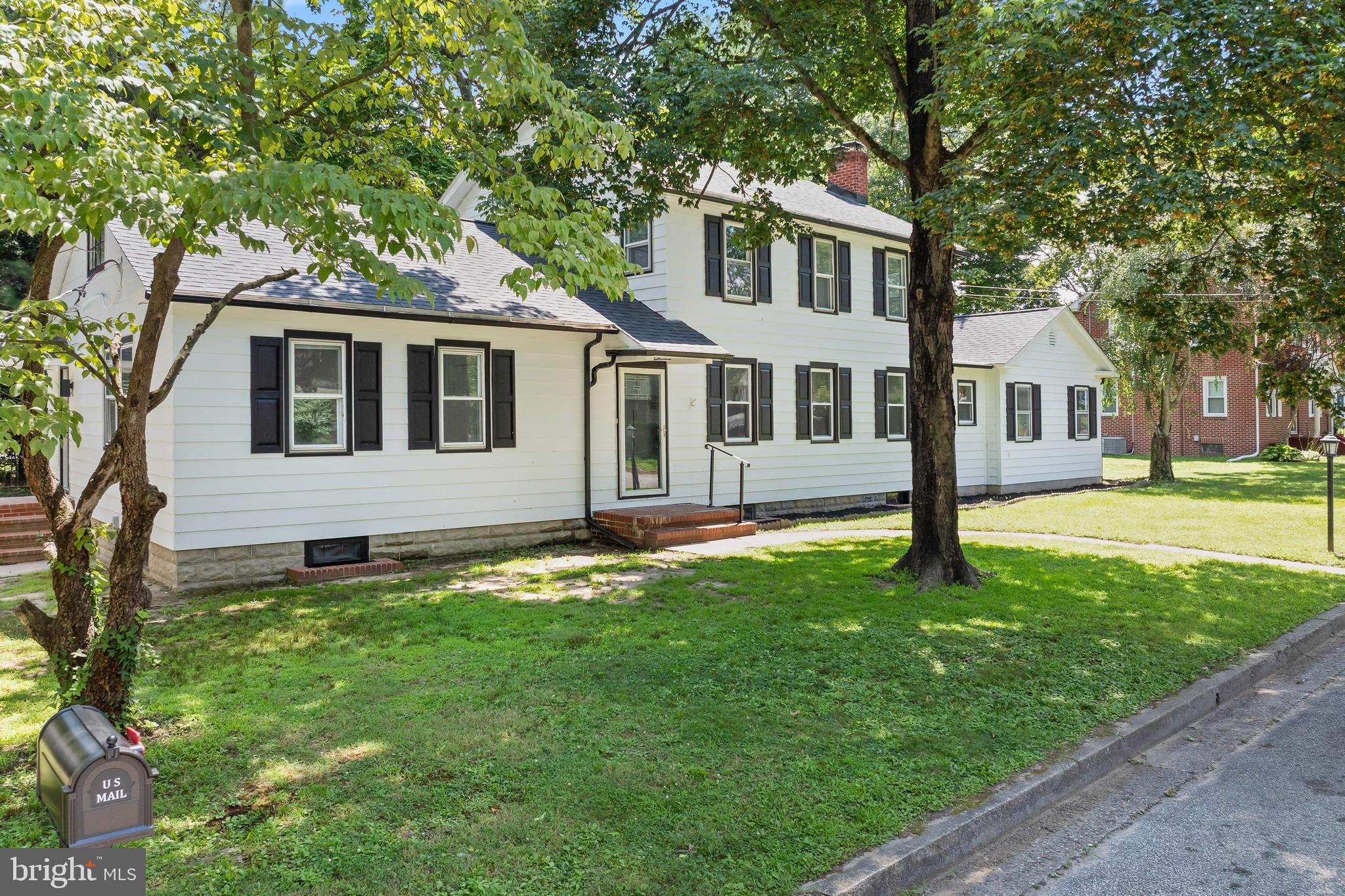 583 Orchard Road Carneys Point, NJ 08069 - Photo 5 of 62 a front view of a house with a yard