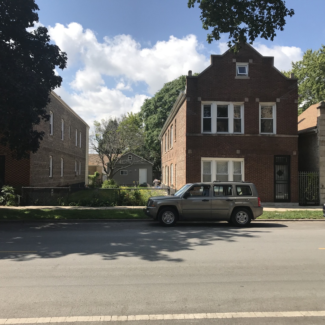 a car parked in front of a house