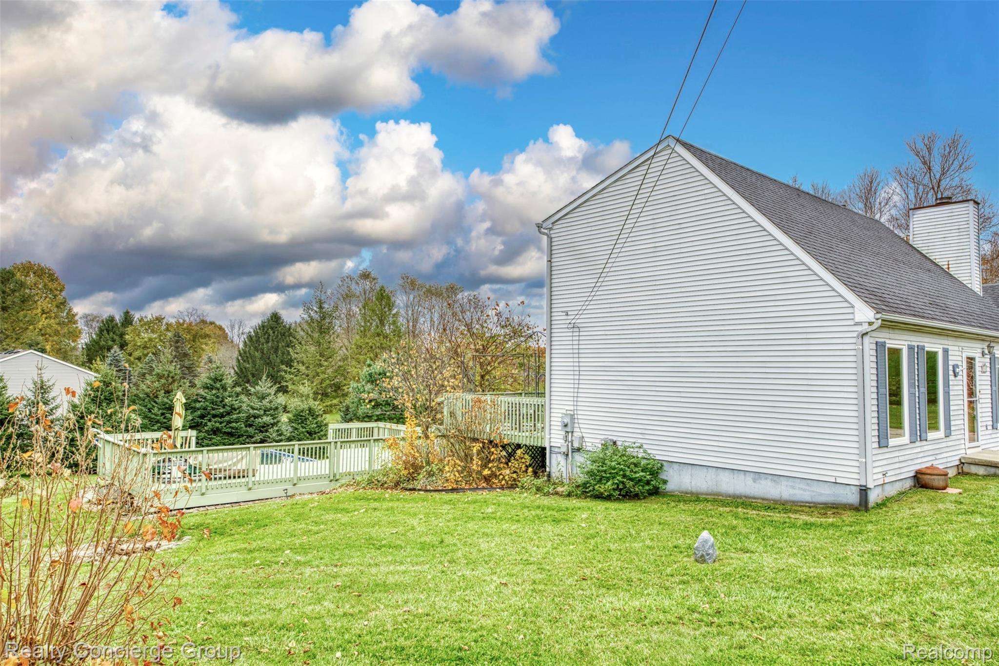 7507 Chilson Road Howell, MI 48843 - Photo 2 of 25 Side of home.jpg
