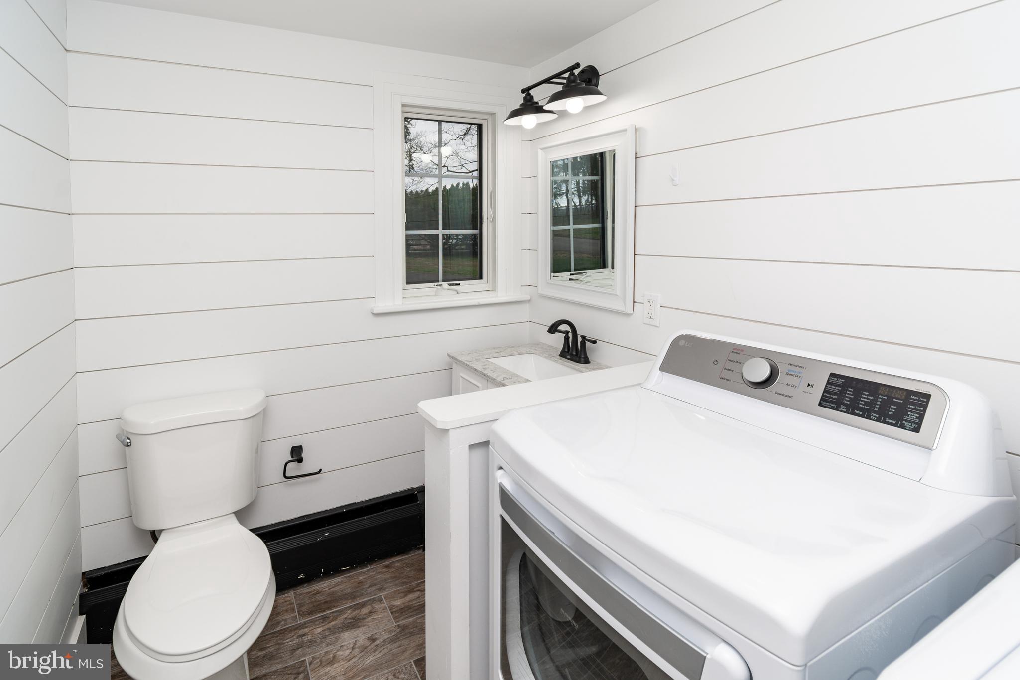 180 Municipal Road Pipersville, PA 18947 - Photo 33 of 60 a bathroom with a sink toilet and window