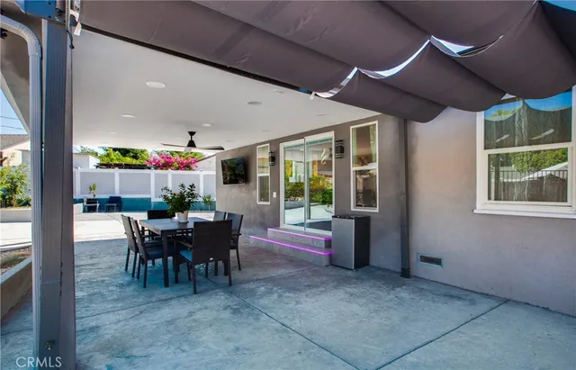 a view of an dining room with furniture window and outside view