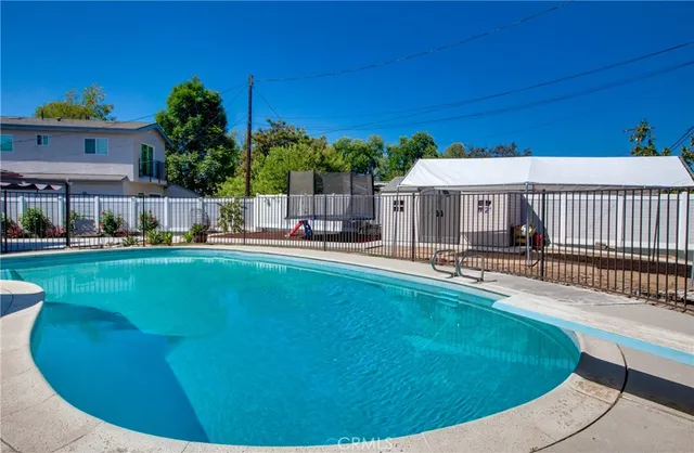 a view of a house with a swimming pool