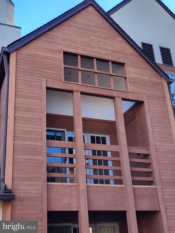a front view of a house with a balcony