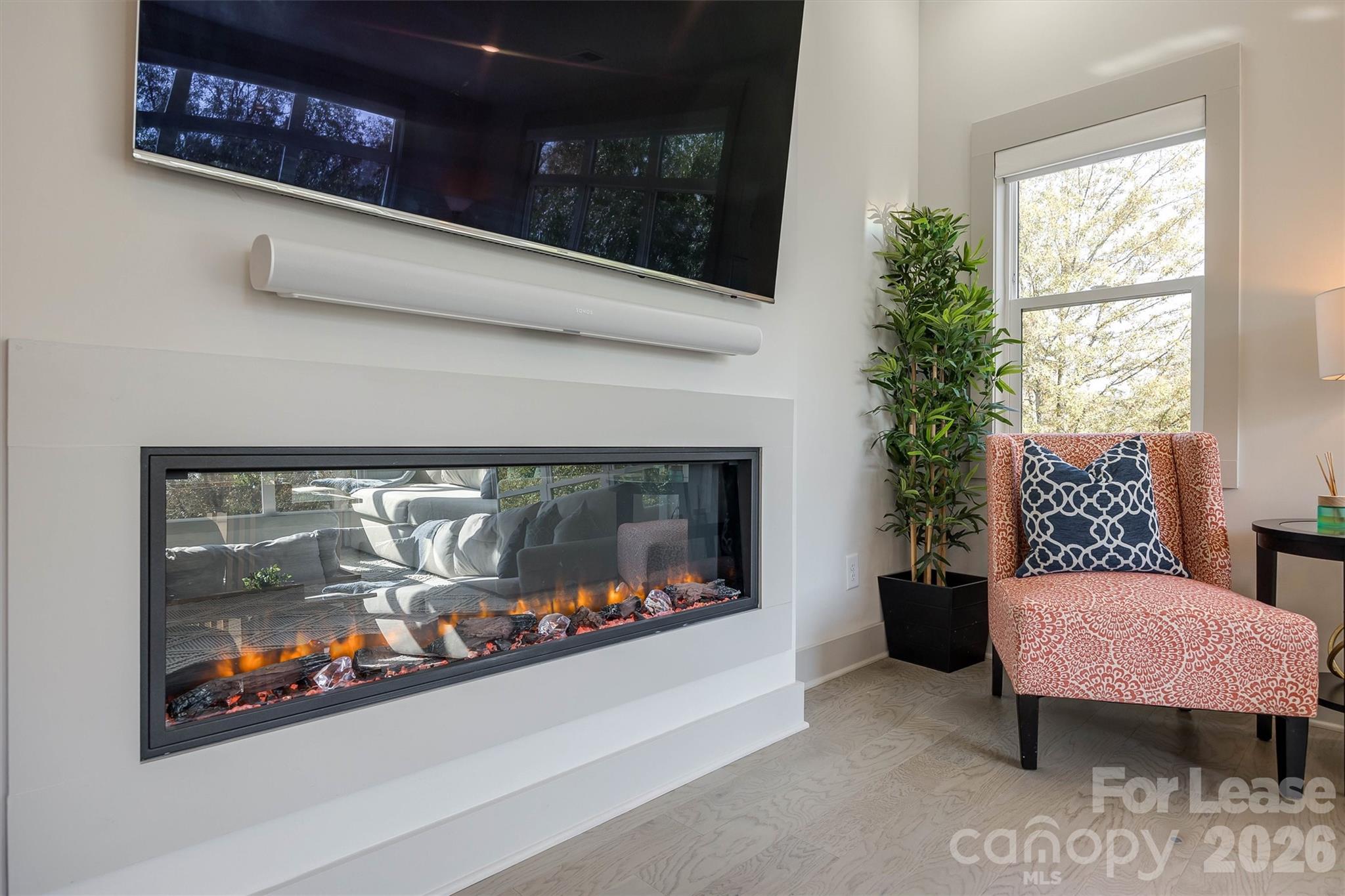 2319 Wesley Village Road Charlotte, NC 28208 - Photo 22 of 44 a outdoor living space with furniture and a fireplace