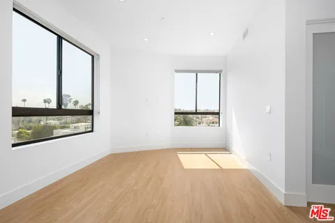 a view of an empty room and window