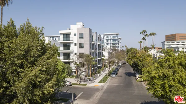 a view of a city with tall buildings