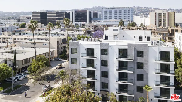 a view of a city with tall buildings