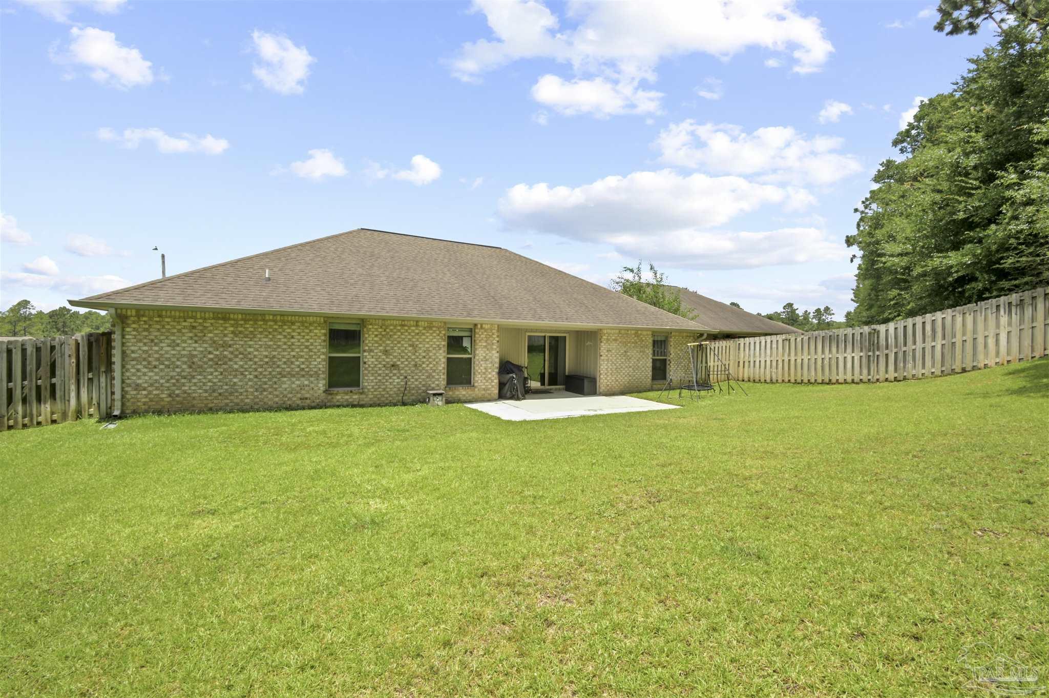 300 Cassady Lane Crestview, FL 32539 - Photo 25 of 25 a front view of a house with garden
